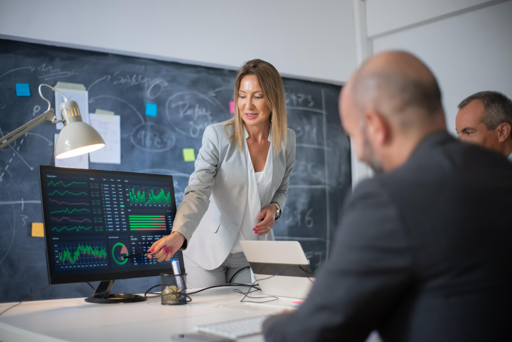 Trade specialist consulting a client about a supply deal